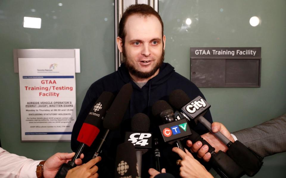 Joshua Boyle speaks to the media after arriving at Toronto Pearson International Airport on Friday - REUTERS