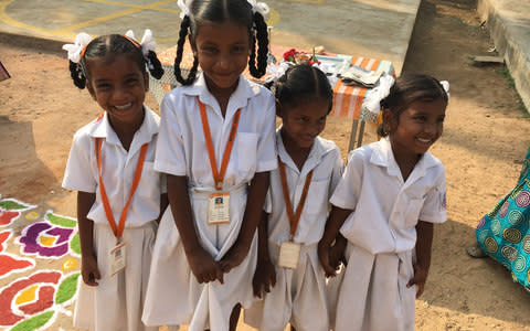 Children from Kovalam primary school, waiting to welcome visitors - Credit: Sylvia Holder