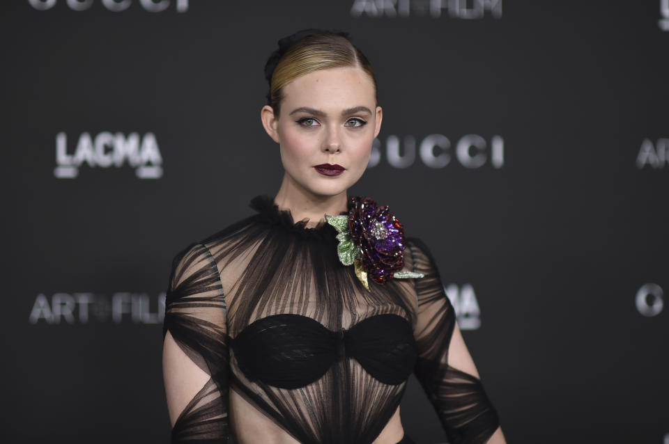 FILE - Elle Fanning arrives at the LACMA Art + Film Gala on Saturday, Nov. 6, 2021, in Los Angeles. Fanning turns 25 on April 9. (Photo by Richard Shotwell/Invision/AP, File)