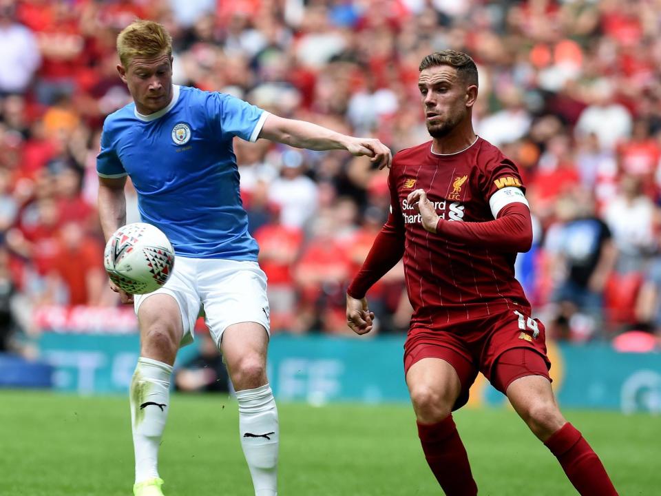 Will Jordan Henderson, right, be able to nullify Kevin De Bruyne?: Getty