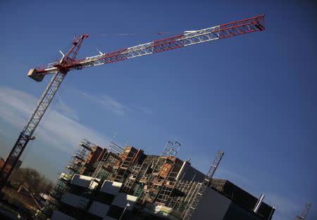 A general view shows a construction site of a residential block in the Valdebebas neighbourhood in Madrid December 10, 2014. REUTERS/Andrea Comas