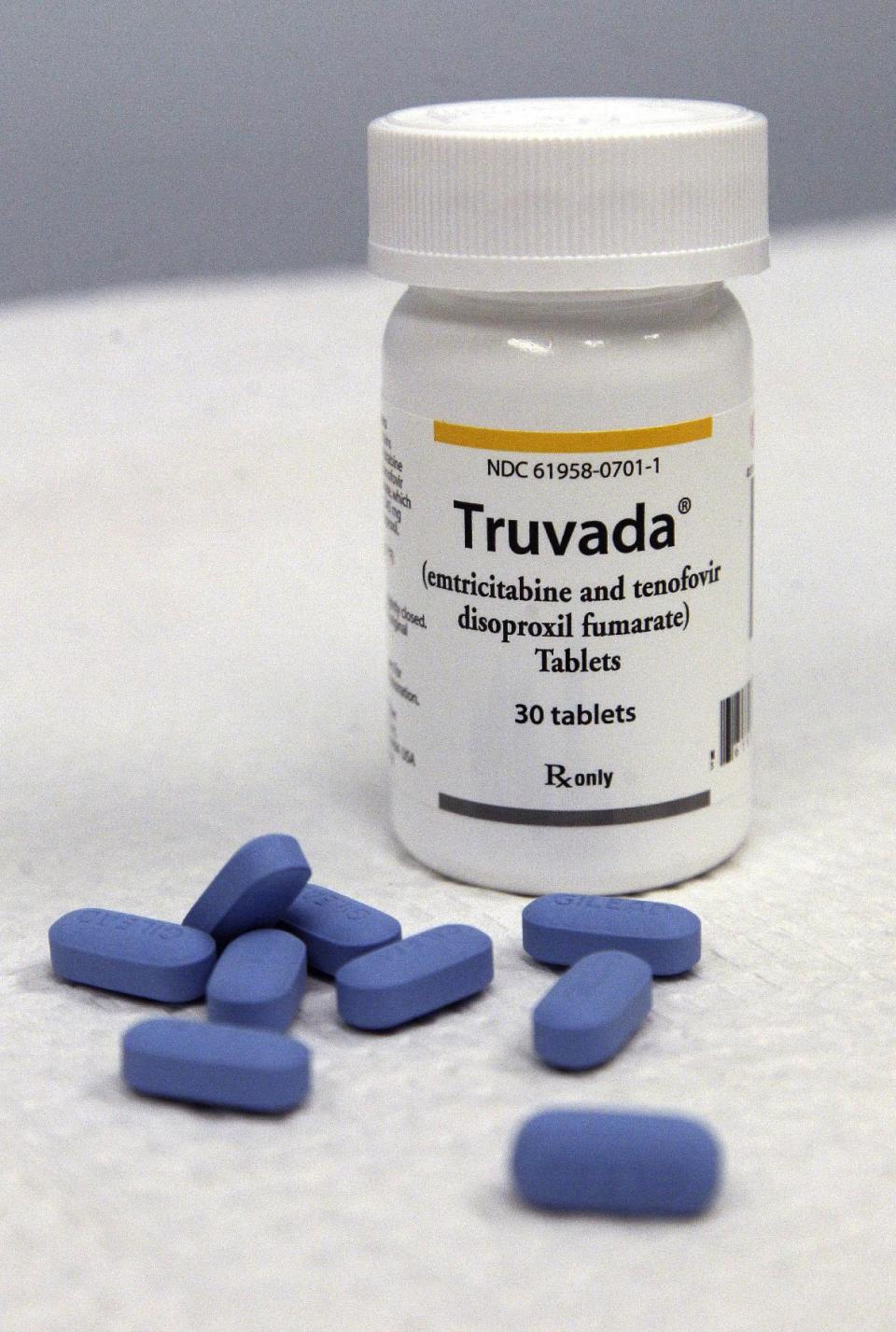 This Thursday, May 10, 2012 photo shows Truvada pills and a bottle in San Francisco. Truvada, a drug hailed as a lifesaver for many people infected by HIV is at the heart of a rancorous debate among gay men, AIDS activists and health professionals over its potential for protecting uninfected men who engage in gay sex without using condoms. (AP Photo/Jeff Chiu)