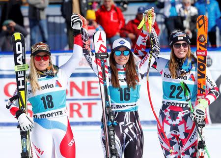 Alpine Skiing - Alpine Skiing World Cup - Women's Super-G race - St. Moritz, Switzerland - 17/3/16 - Lara Gut of Switzerland, Tina Weirather of Liechtenstein and Cornelia Huetter of Austria react REUTERS/Arnd Wiegmann
