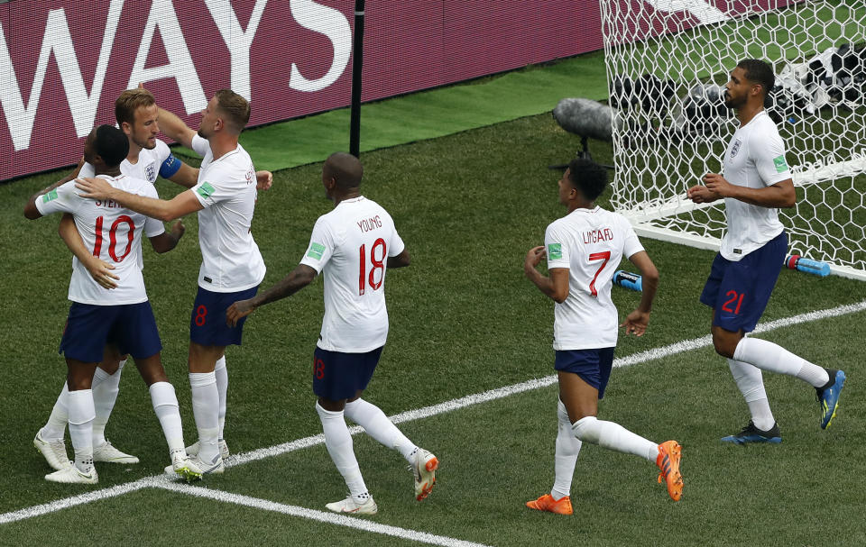 <p>England’s Harry Kane, left, celebrates with his teammates after scoring his second penalty </p>