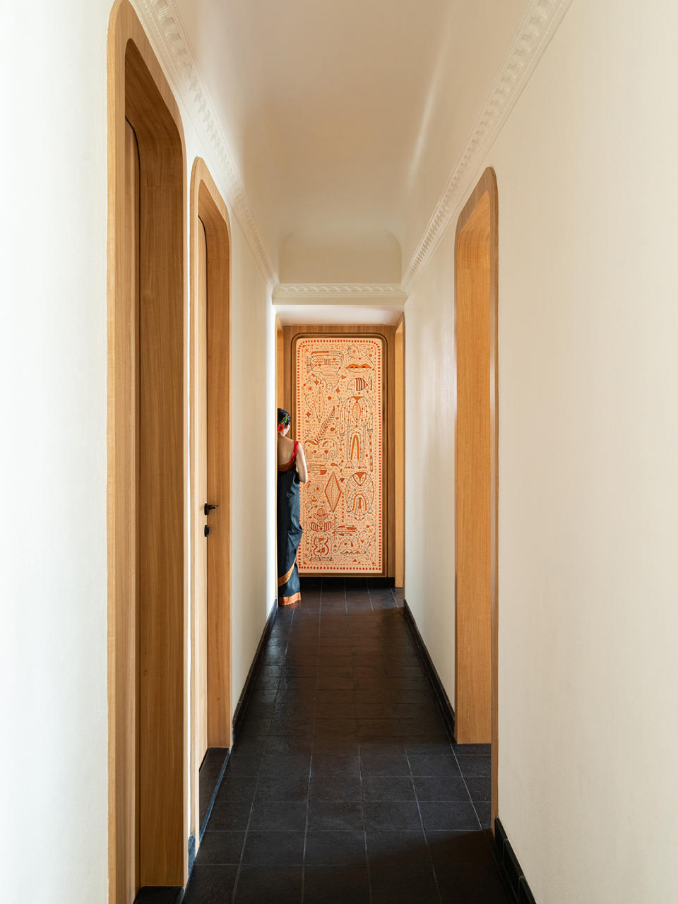 hallway with black tile