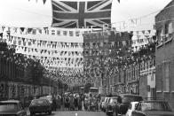 People gather to celebrate for Queen Elizabeth II Jubilee Day on Prothero Road, Fulham, in London, May 5, 1977. (AP Photo/Nancy Kaye)
