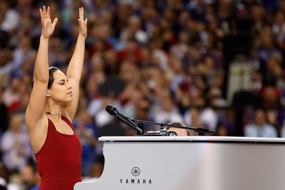 Alicia Keys performs the National Anthem prior to the start of Super Bowl XLVII between the Baltimore Ravens and the San Francisco 49ers at the Mercedes-Benz Superdome on February 3, 2013 in New Orleans, Louisiana. (Photo by Chris Graythen/Getty Images)