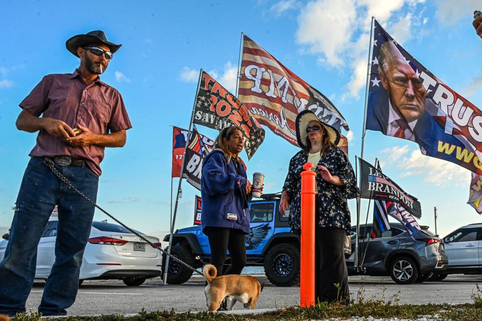 Supporters of former President Donald Trump protest near his Mar-a-Lago estate in Palm Beach, Fla., on March 21, 2023.