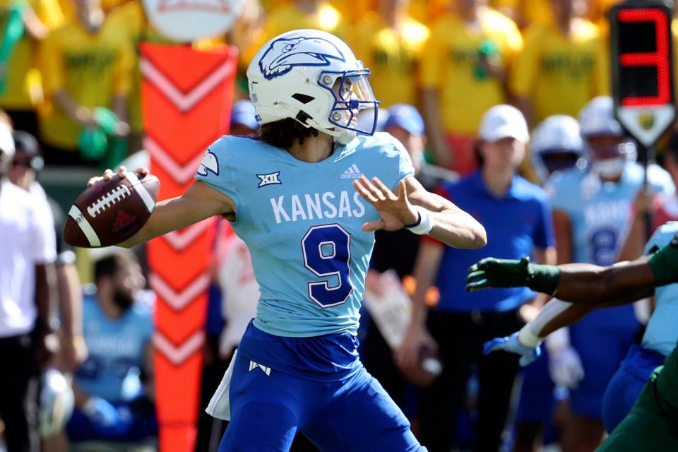 Kansas quarterback Jason Bean looks to pass against Baylor in the first half of a game Saturday in Waco, Texas.