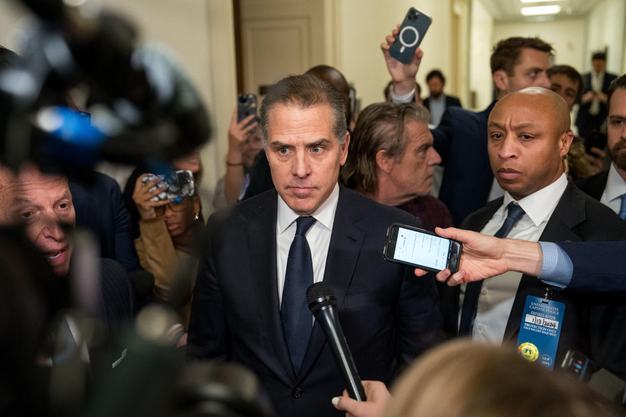 Hunter Biden leaves a House Oversight Committee meeting on Capitol Hill.