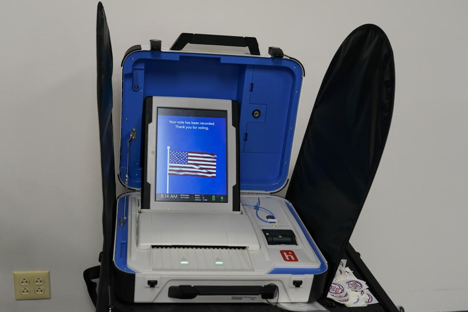 A voting machine displays, "Your vote has been recorded. Thank you for voting", after a voter successfully scanned a ballot during early in-person voting at the Hamilton County Board of Elections in Cincinnati, Wednesday, Oct. 11, 2023. (AP Photo/Carolyn Kaster)
