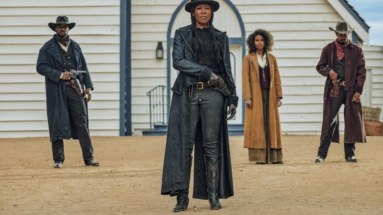 the harder they fall l to r jt holt as marys guard, regina king as trudy smith, zazie beetz as mary fields, justin clarke as marys guard in the harder they fall cr david lee netflix 2021