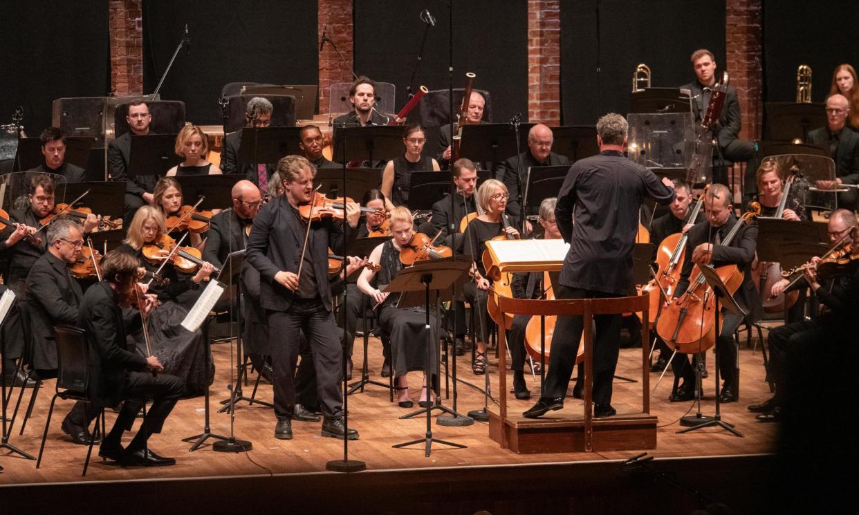 <span>Magnetic intensity … Daniel Pioro (centre left) performs with the BBCSO conducted by Ryan Wigglesworth.</span><span>Photograph: PR</span>