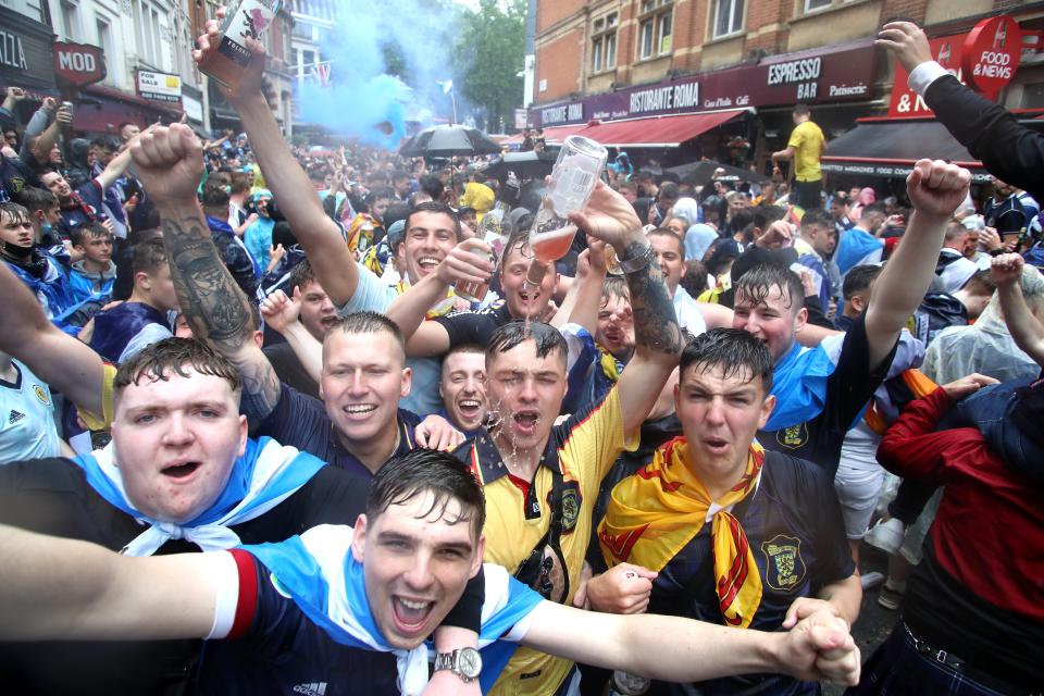 Scotland fans gather in Leicester Square before the UEFA Euro 2020 match between England and Scotland later tonight. (PA)
