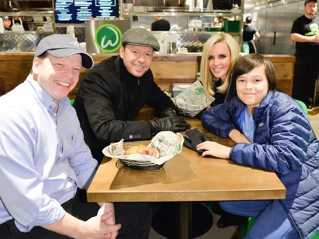 <p>George Pimentel/WireImage</p> Paul Wahlberg, Donnie Wahlberg, Jenny McCarthy and Elijah Wahlberg enjoy a Wahlbuger at the Canadian launch of Wahlburgers Family Restaurant on November 15, 2014.