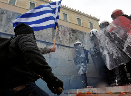 Protesters clash with police officers during a demonstration against the agreement reached by Greece and Macedonia to resolve a dispute over the former Yugoslav republic's name, in Athens, Greece, January 20, 2019. REUTERS/Alexandros Avramidis