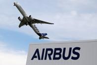 An Airbus A350-1000 performs during the 53rd International Paris Air Show at Le Bourget Airport near Paris