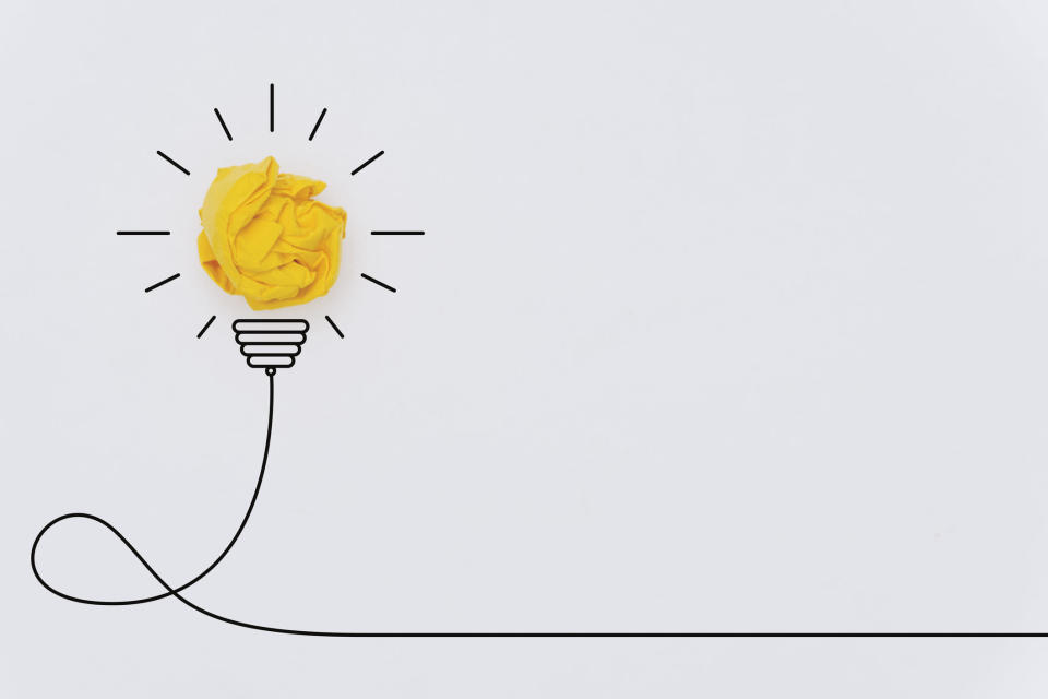 Bulb drawing made from Yellow Crumpled Paper Ball; investor presentation tips