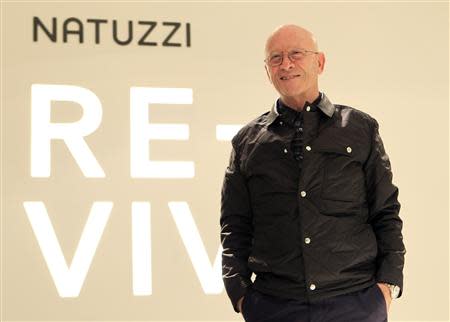 Natuzzi Group's CEO and President Pasquale Natuzzi poses for a photo in a store downtown Milan December 10, 2013. REUTERS/Alessandro Garofalo