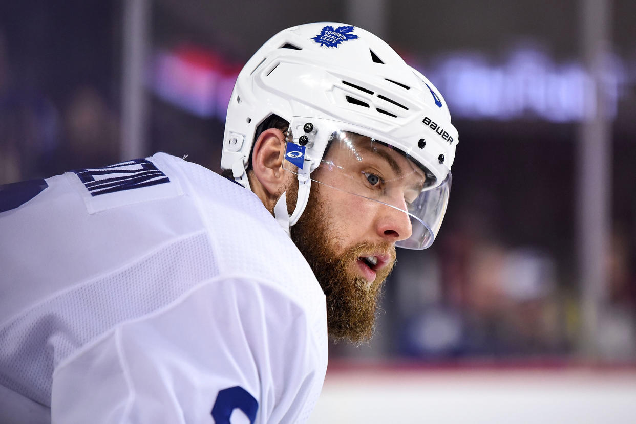 CALGARY, AB - DECEMBER 12: Toronto Maple Leafs Defenceman Jake Muzzin (8) looks on before a face-off during the second period of an NHL game where the Calgary Flames hosted the Toronto Maple Leafs on December 12, 2019, at the Scotiabank Saddledome in Calgary, AB. (Photo by Brett Holmes/Icon Sportswire via Getty Images)