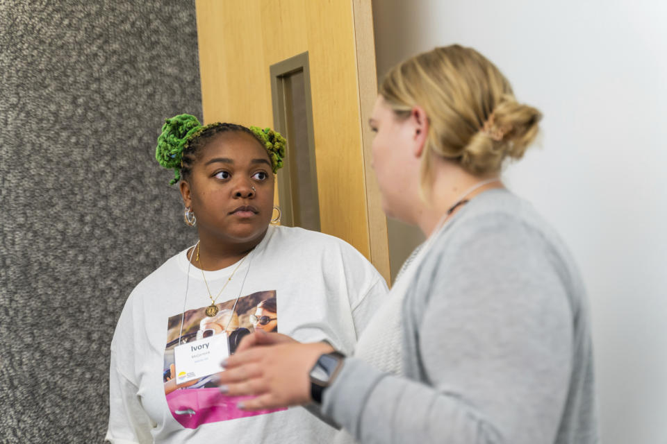 Ivory McCormick, a kindergarten teacher from Atlanta, talks about her experiences teaching math with another educator during an icebreaker session at the Erickson Institute's summer learning program in Chicago on Wednesday, July 12, 2023. “It was really hard in the beginning for me to find a connection to it — I was kind of just doing it because it was part of my job,” McCormick said. “But this past year, I have kind of revamped my thoughts about what math can be and the ways that we teach it in order to make kids want to learn about it and be enthusiastic about it. Because the way we present it to them holds so much more weight than I think I ever realized.” (Camilla Forte/The Hechinger Report via AP)