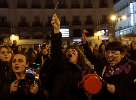 Women bang pots and pans during a protest at the start of a nationwide feminist strike on International Women's Day at Puerta del Sol Square in Madrid, Spain, March 8, 2019.REUTERS/Susana Vera