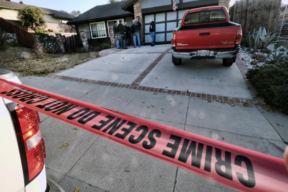 Ventura County Sheriff’s deputies are seen outside the house of shooting suspect David Ian Long in Newbury Park, Calif., on Nov. 8, 2018. (Photo: Richard Vogel/AP)