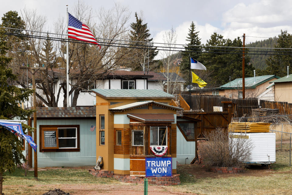 A sign supporting President Donald Trump sits in the yard of a home across from Woodland Park High School on April 12, 2023 in Woodland Park, Colo. (Michael Ciaglo for NBC News)