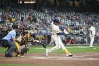 Milwaukee Brewers' Blake Perkins gets an RBI hit during the eighth inning of a baseball game against the San Diego Padres Wednesday, April 17, 2024, in Milwaukee. (AP Photo/Morry Gash)