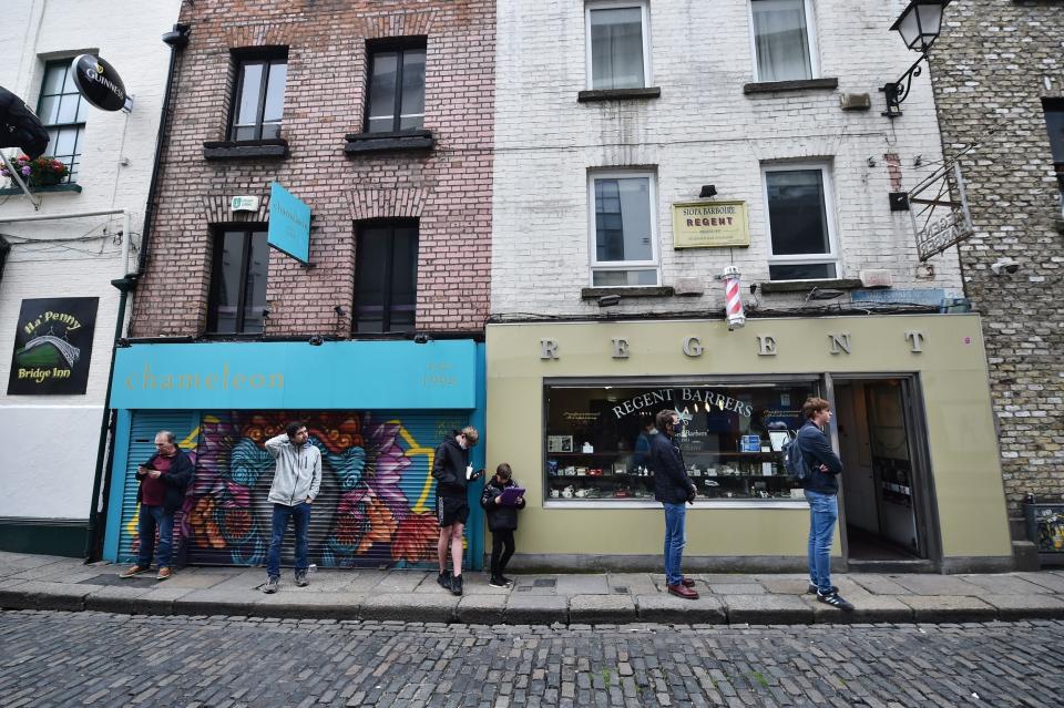 People queue outside shops in Dublin (Getty Images)