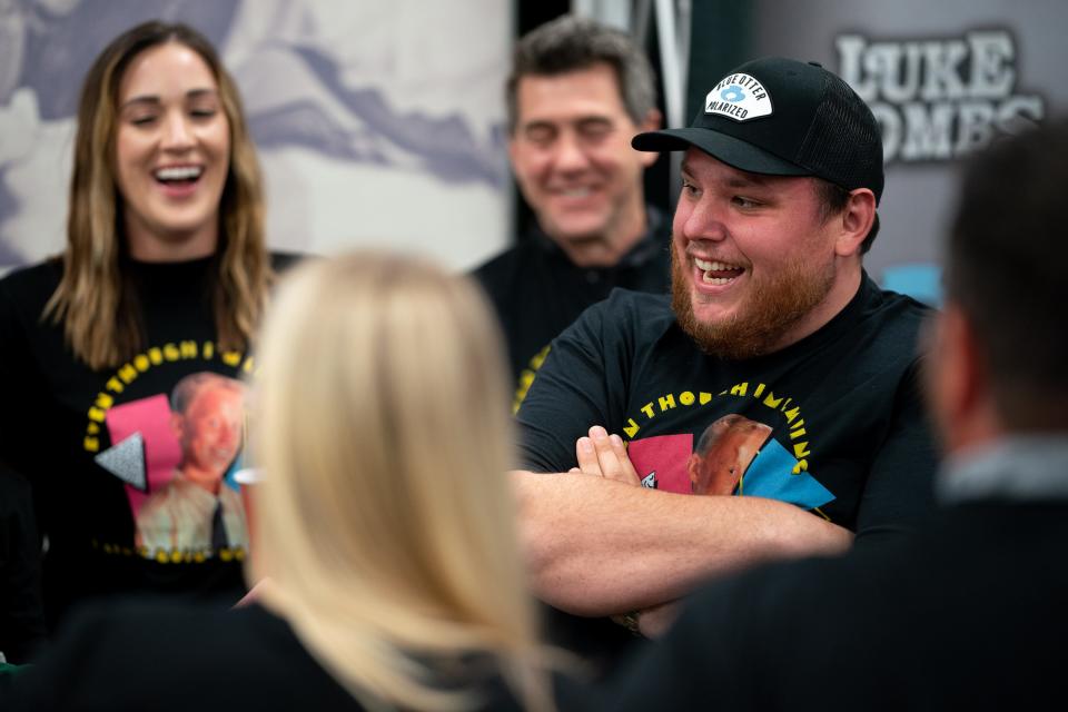 Luke Combs greets guests before performing at Empower Field at Mile High in Denver, Colo., Saturday, May 21, 2022. The show kicked off Combs’ first-ever headlining stadium tour.