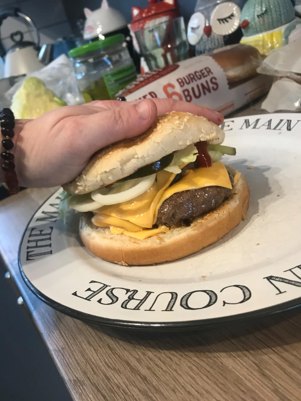 She picked up a pack of four reduced-price burgers for 65p at Asda and bought the bread buns from a corner shop (Picture: Mercury)