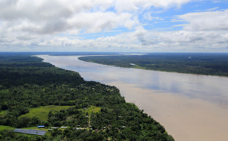 FILE PHOTO: An aerial view of the Amazon river, before the signing of a document by Colombia's President Juan Manuel Santos that will allow for the conservation of the Tarapoto wetland complex in Amazonas, Colombia January 18, 2018. REUTERS/Jaime Saldarriaga/File Photo