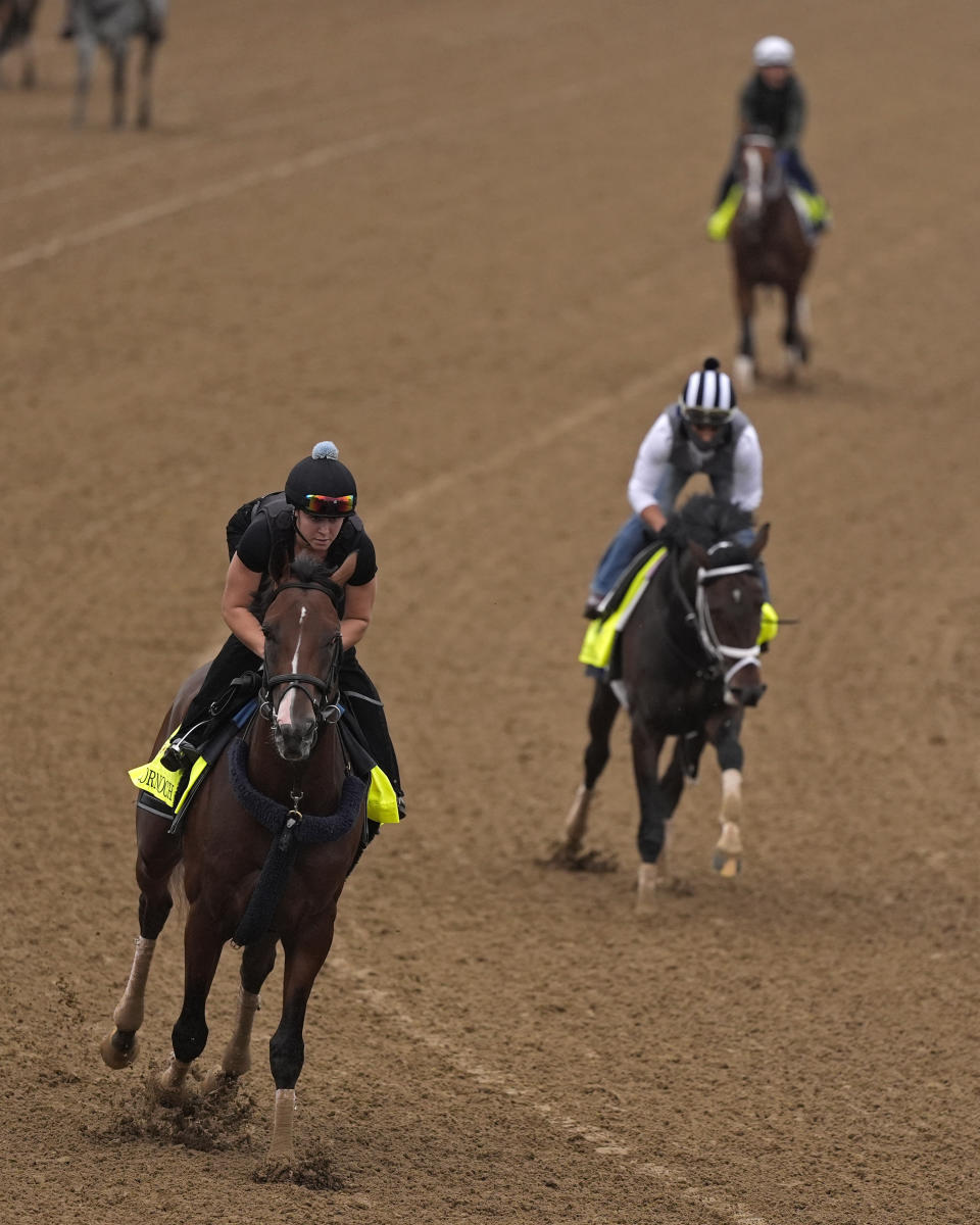 Kentucky Derby hopeful Dornoch, front, works out at Churchill Downs Tuesday, April 30, 2024, in Louisville, Ky. The 150th running of the Kentucky Derby is scheduled for Saturday, May 4. (AP Photo/Charlie Riedel)