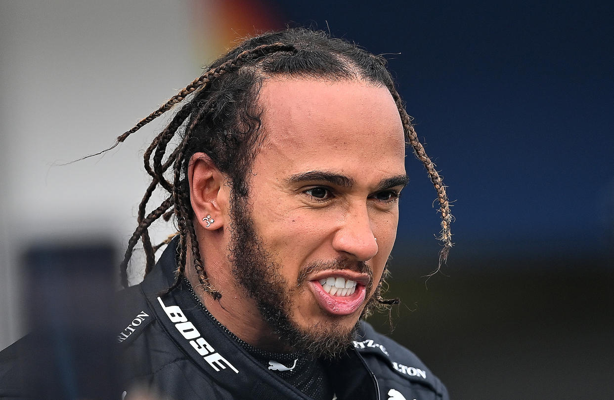 BUDAPEST, HUNGARY - JULY 19: Race winner Lewis Hamilton of Great Britain and Mercedes GP reacts in parc ferme after the Formula One Grand Prix of Hungary at Hungaroring on July 19, 2020 in Budapest, Hungary. (Photo by Clive Mason - Formula 1/Formula 1 via Getty Images)