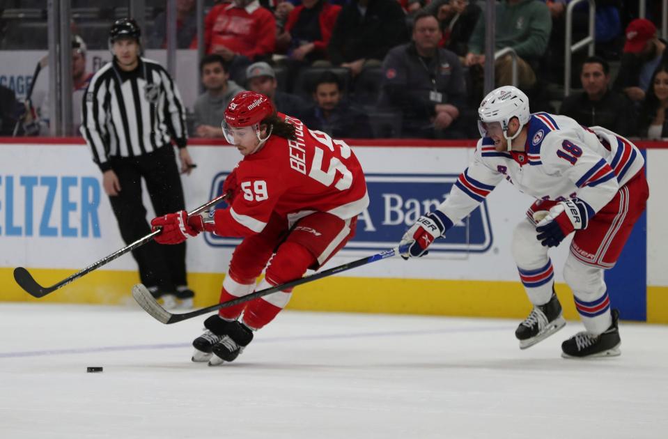 Detroit Red Wings left wing Tyler Bertuzzi (59) skates against New York Rangers center Andrew Copp (18) during third period action on Wednesday, March 30, 2022, at Little Caesars Arena in Detroit.