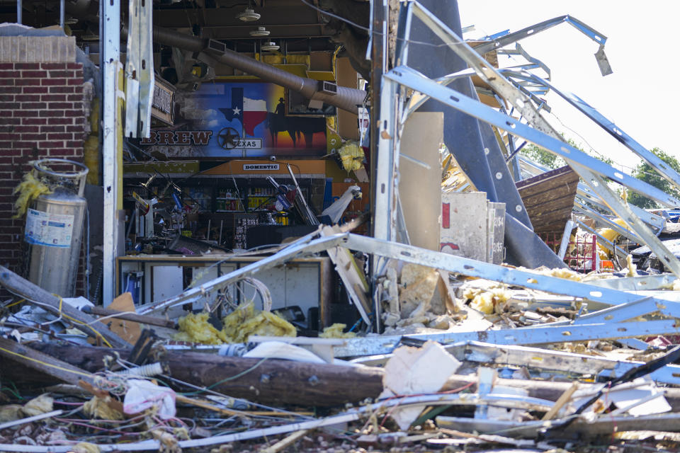 Damage is seen at a truck stop the morning after a tornado rolled through, Sunday, May 26, 2024, in Valley View, Texas. Powerful storms left a wide trail of destruction Sunday across Texas, Oklahoma and Arkansas after obliterating homes and destroying a truck stop where drivers took shelter during the latest deadly weather to strike the central U.S. (AP Photo/Julio Cortez)