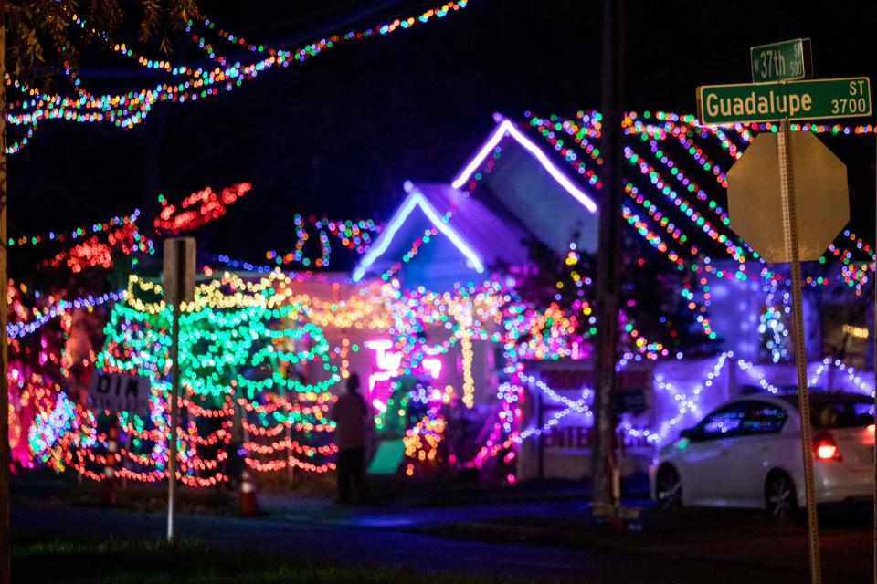 Austinites visit the 37th Street lights on Dec. 12, 2022. The annual tradition has been happening on and off since the 1980s.