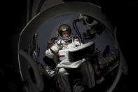 Pilot Felix Baumgartner of Austria sits in his capsule and prepares for the pre-breathing procedure during the preparations for the final manned flight of the Red Bull Stratos mission in Roswell, New Mexico, USA on October 6, 2012.