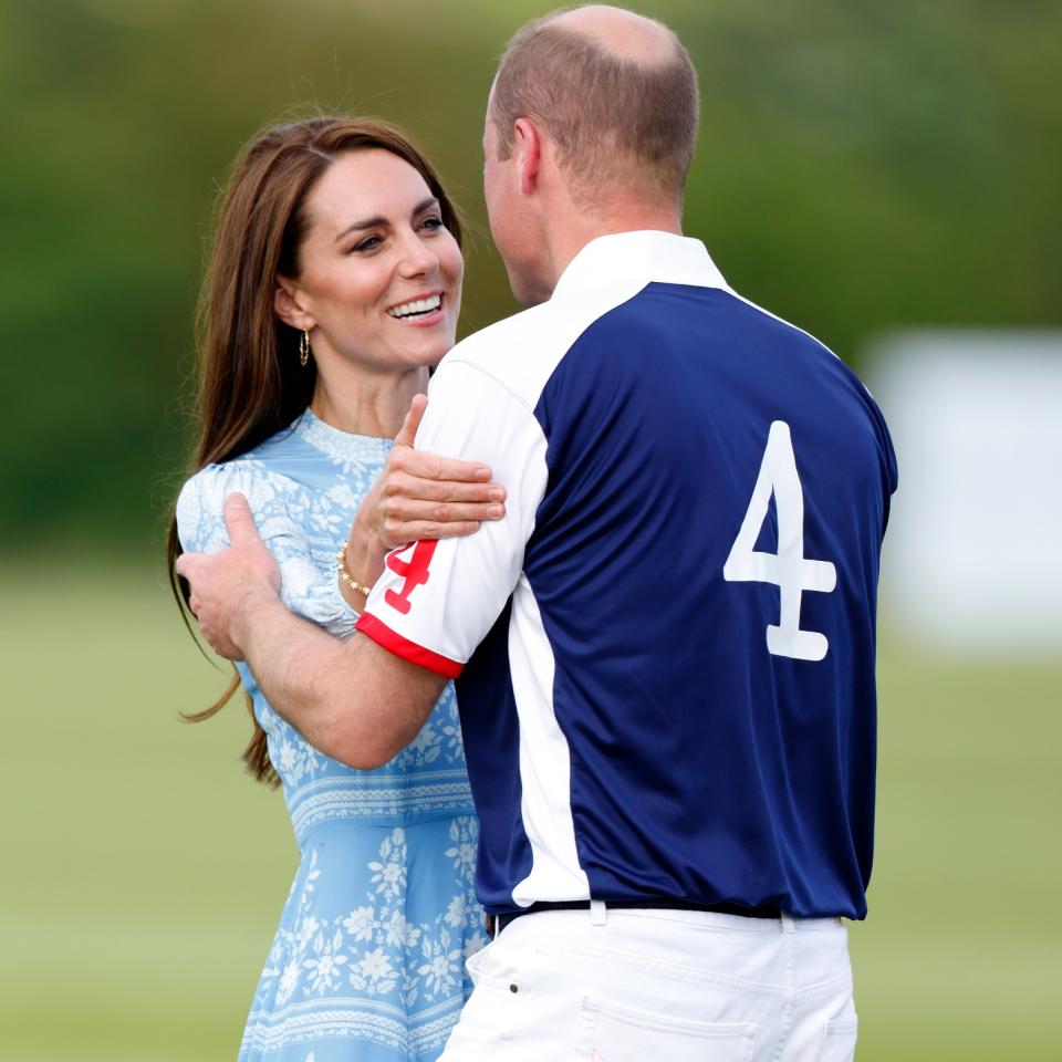 Prince William and Kate Middleton kissing at polo