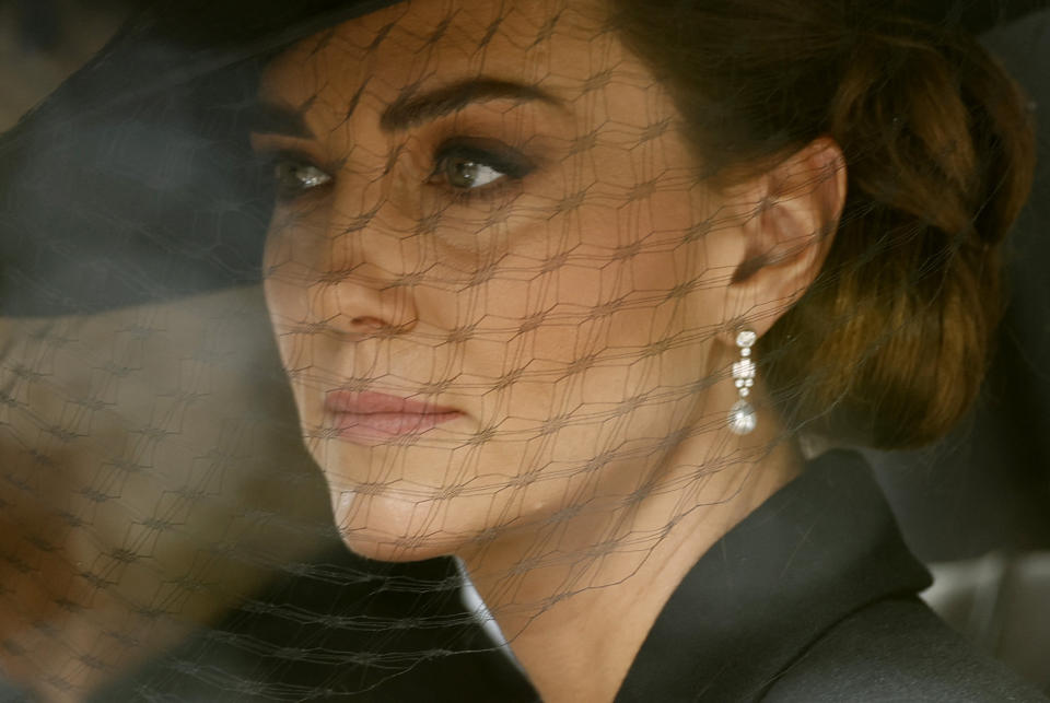 <p>Britain's Catherine, Princess of Wales is seen in a car during the procession following the service, on the day of the state funeral and burial of Britain's Queen Elizabeth, in London, Britain, September 19, 2022 REUTERS/Peter Cziborra</p> 