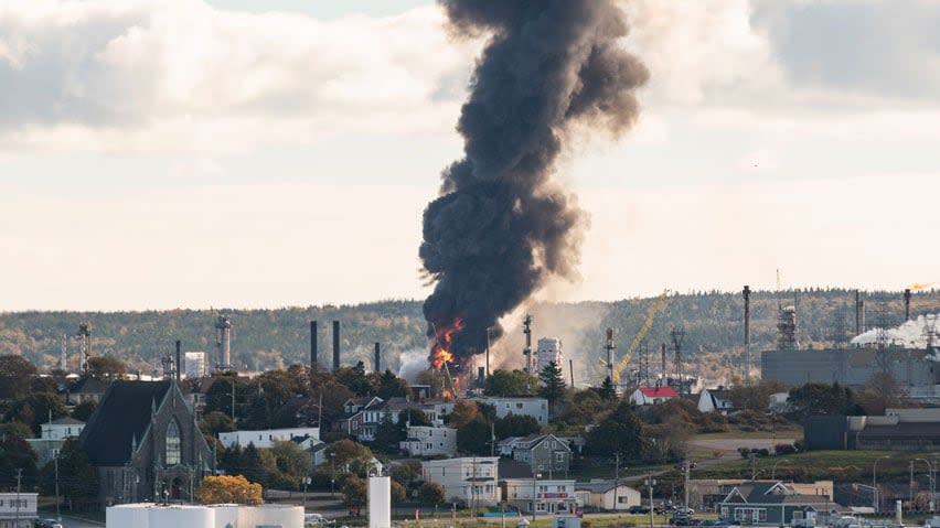 Several Saint John residents reported a 'bed-shaking explosion' at the Irving Oil refinery on the city's east side Monday morning and black smoke billowed over the area.