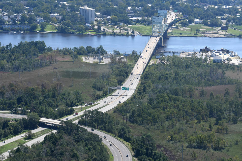 An aerial photo showing U.S. 74-76 approaching Wilmington and the Cape Fear Memorial Bridge from Brunswick County.