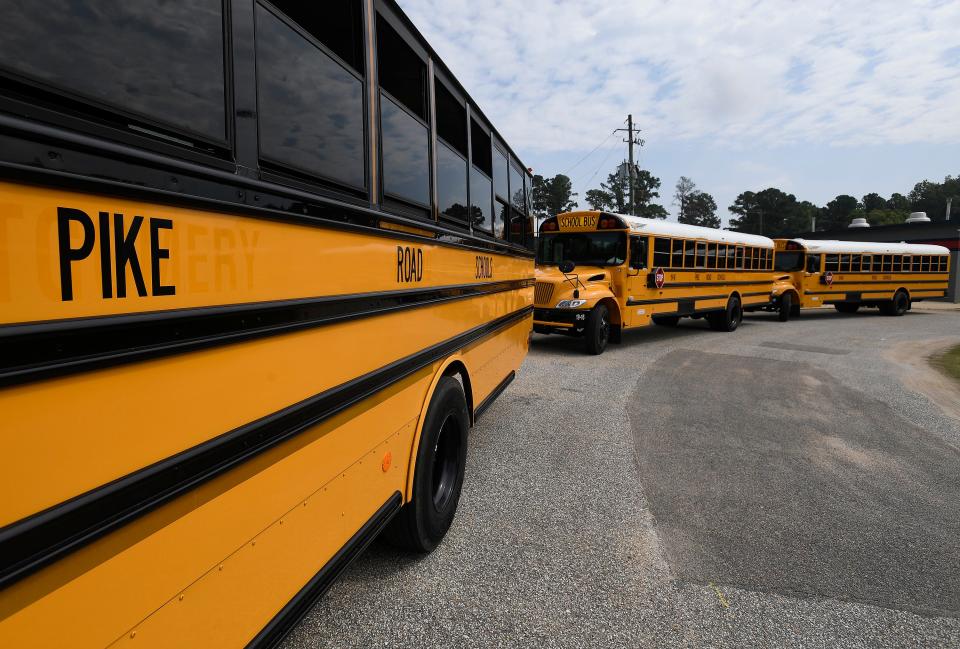 School buses at Pike Road High School, located in the old Georgia Washington Middle School building in Pike Road, Ala., on Tuesday August 14, 2018. 