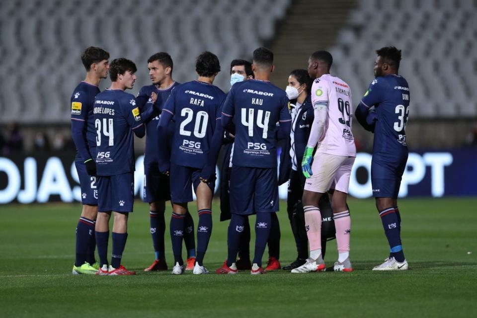 Belenenses players at the match versus Benfica on Saturday (EPA)