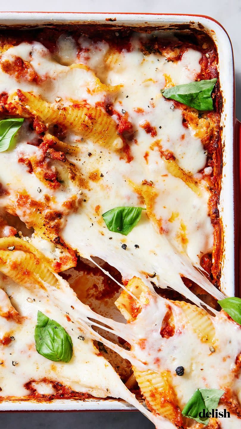 stuffed shells with marinara sauce mozzarella ricotta cream cheese and pecorino