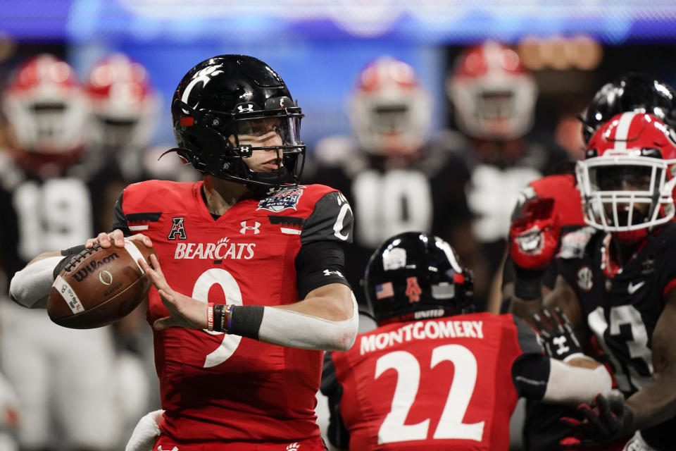 Cincinnati quarterback Desmond Ridder (9) sits in the pocket against Georgia during the first half of the Peach Bowl college football game on Jan. 1. (AP)