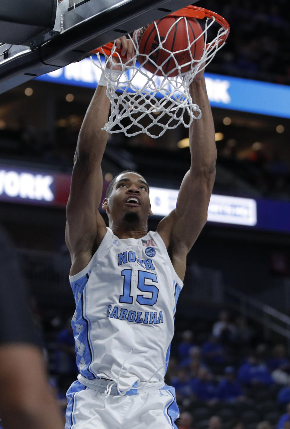 North Carolina's Garrison Brooks (15) dunks against UCLA during the first half of an NCAA college basketball game Saturday, Dec. 21, 2019, in Las Vegas. (AP Photo/John Locher)