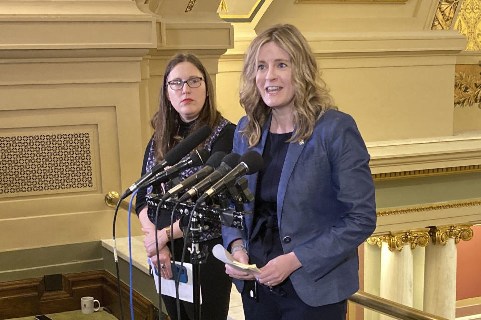 Democratic Rep. Kelly Moller, of Shoreview, chair of the Minnesota House Public Safety Committee, speaks at a news conference in the Minnesota state Capitol in St. Paul, Minn., Tuesday, April 25, 2023, ahead of a House debate on a "red flag law" to allow temporary confiscation of guns from people judged to be an immediate threat to themselves or others, as well as another proposal for expanded background checks for firearms transfers. The two gun safety measures were part of a wide-ranging public safety bill by Moeller that lawmakers were expected to debate late into the night. (AP Photo/Steve Karnowski)