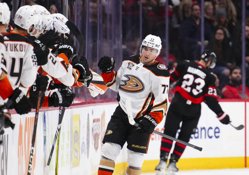 Anaheim Ducks right wing Frank Vatrano (77) is congratulated for his goal against the Ottawa Senators during the second period of an NHL hockey game Thursday, Feb. 15, 2024, in Ottawa, Ontario. (Sean Kilpatrick/The Canadian Press via AP)